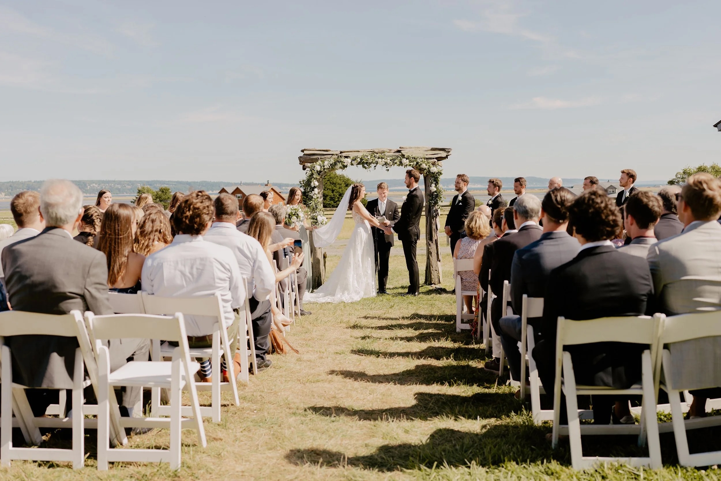 couple getting married at crockett farms at whidbey island wedding